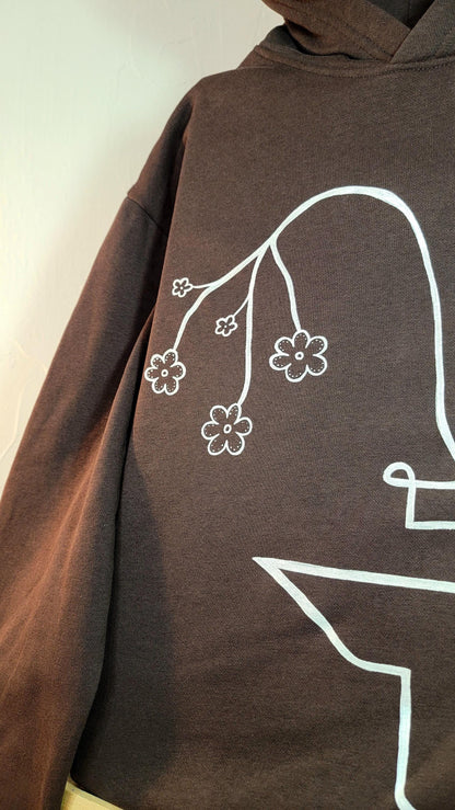 Sweat à capuche peint à la main. "Sous un baiser, l'infini devient palpable" - Taille S